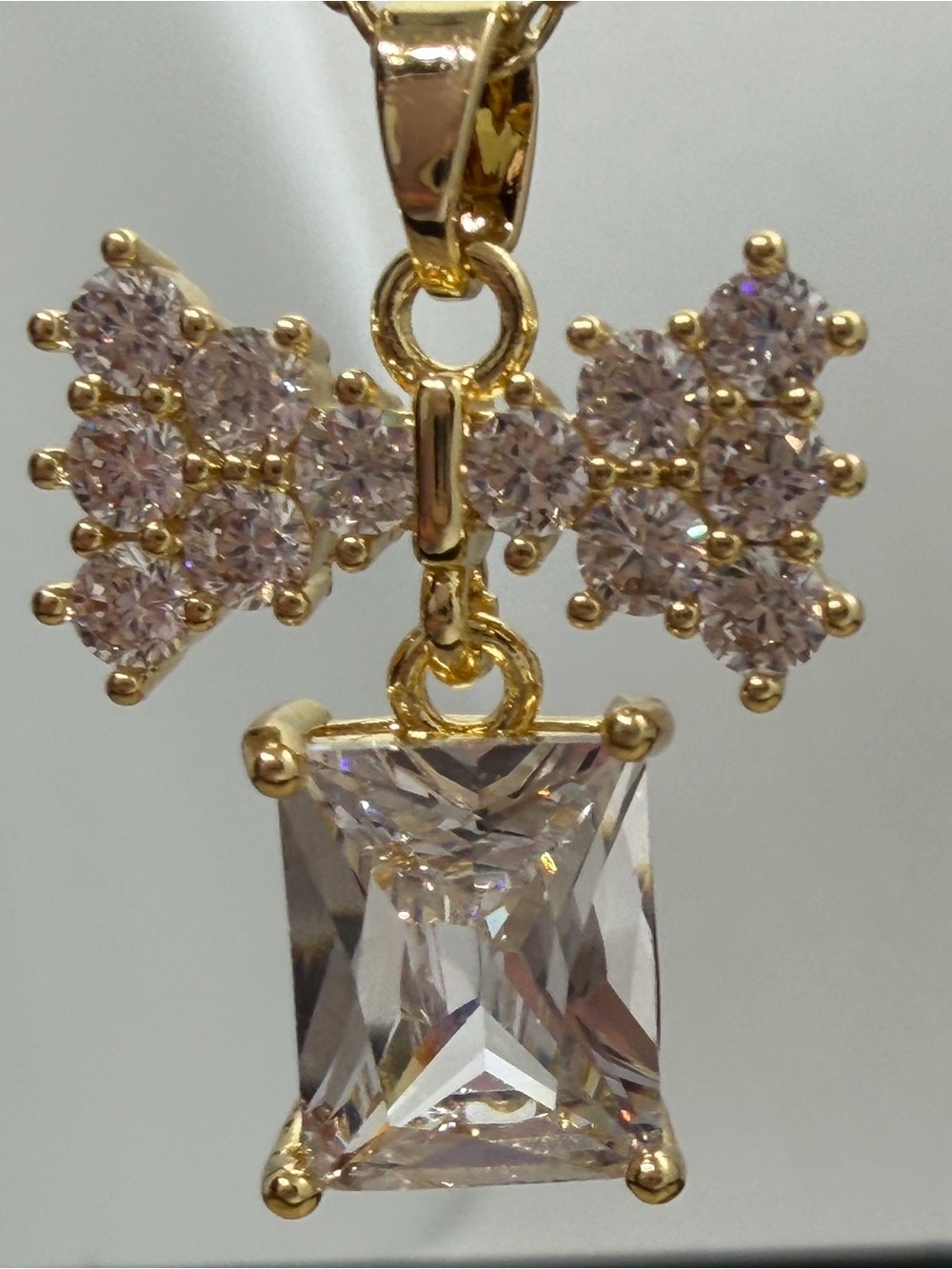 Gold-Tone Crystal Bow Pendant Necklace